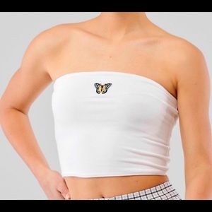 white hollister tube top with a butterfly.